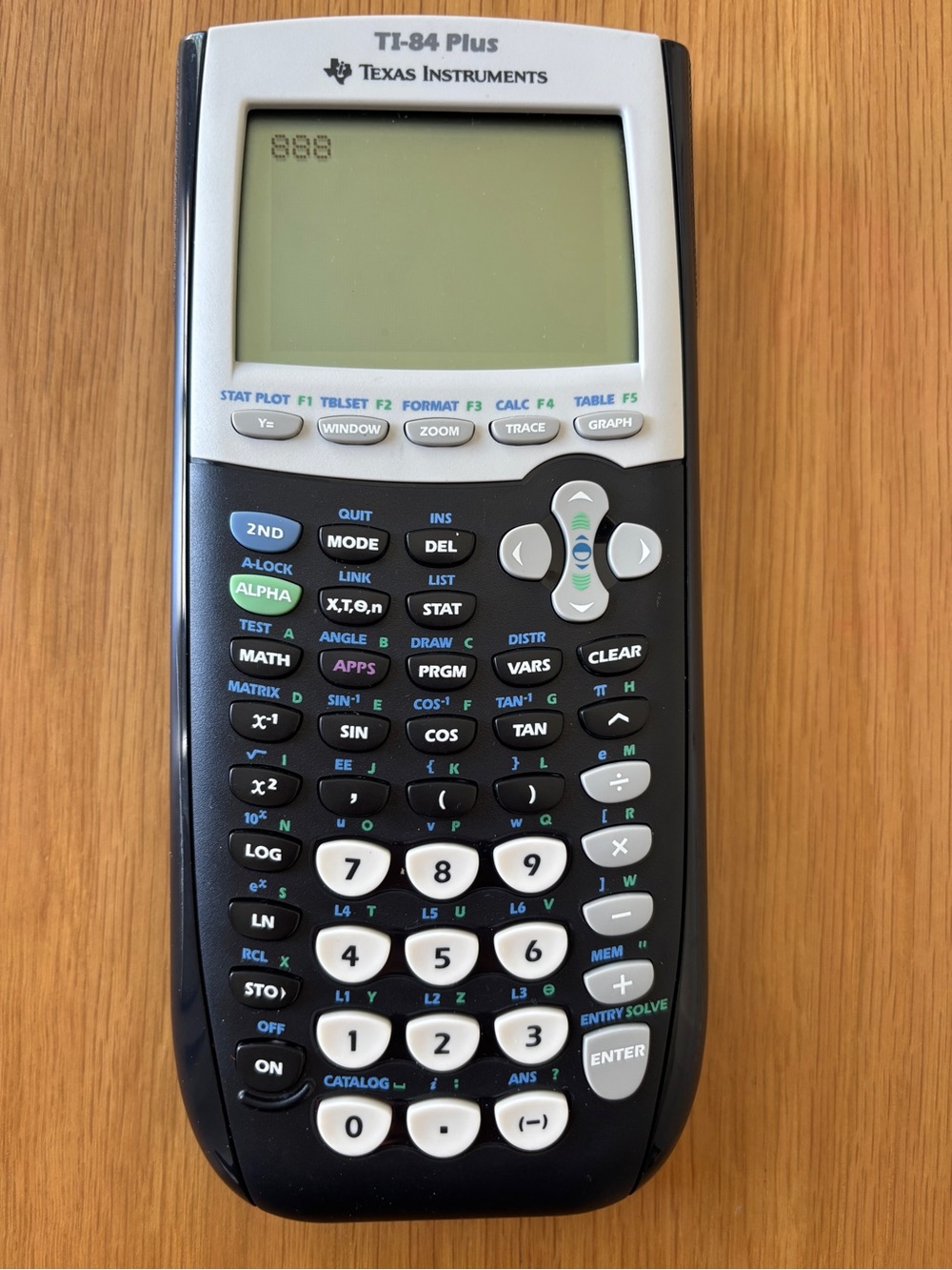 Texas Instruments TI-84 Plus Graphing Calculator in Black and White